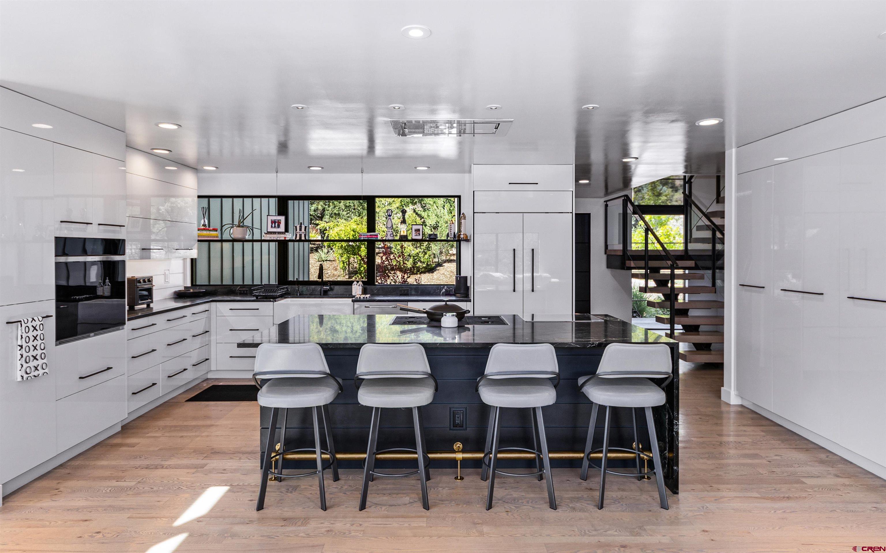 12 Falcon Way Durango, CO 81301 - Photo 11 of 38 a large kitchen with a table and chairs