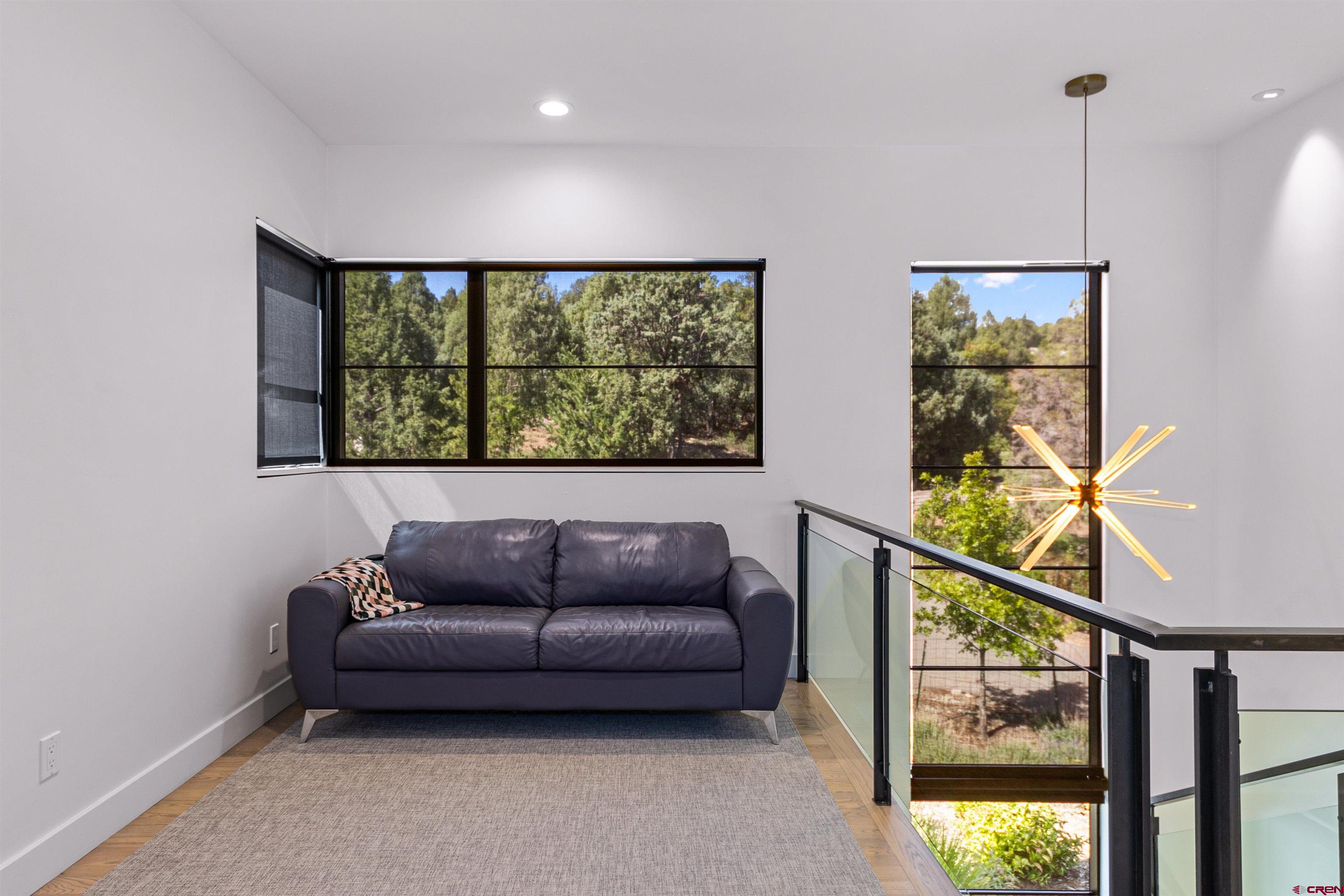 12 Falcon Way Durango, CO 81301 - Photo 22 of 38 a living room with furniture and a large window