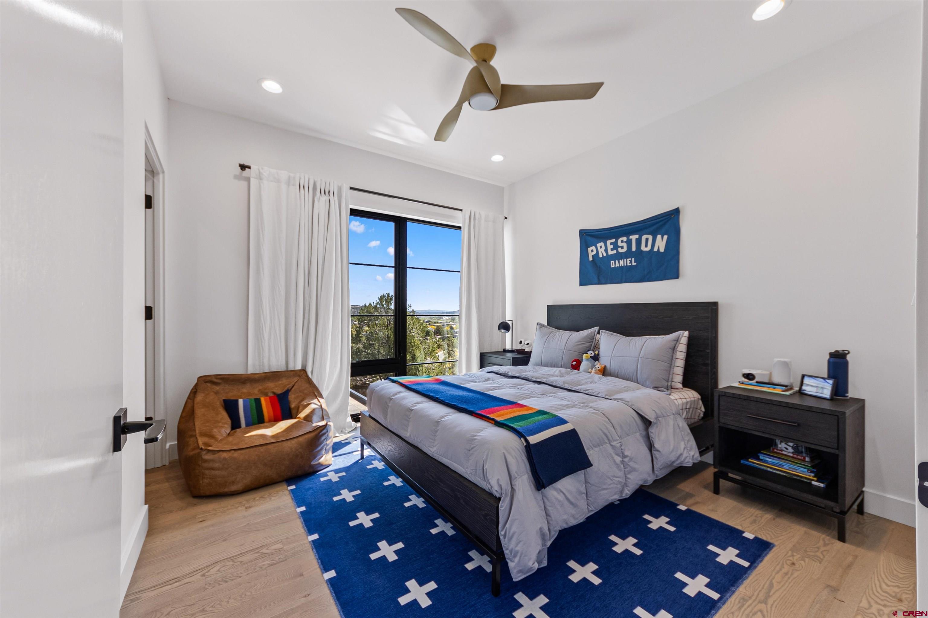 12 Falcon Way Durango, CO 81301 - Photo 25 of 38 a bedroom with a bed and a couch