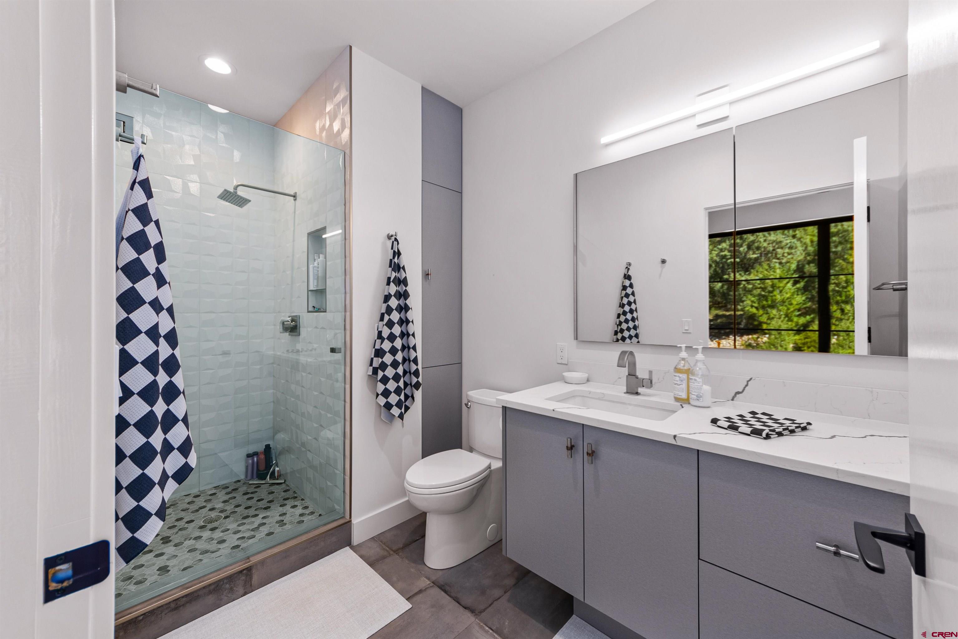 12 Falcon Way Durango, CO 81301 - Photo 26 of 38 a bathroom with a sink toilet and shower