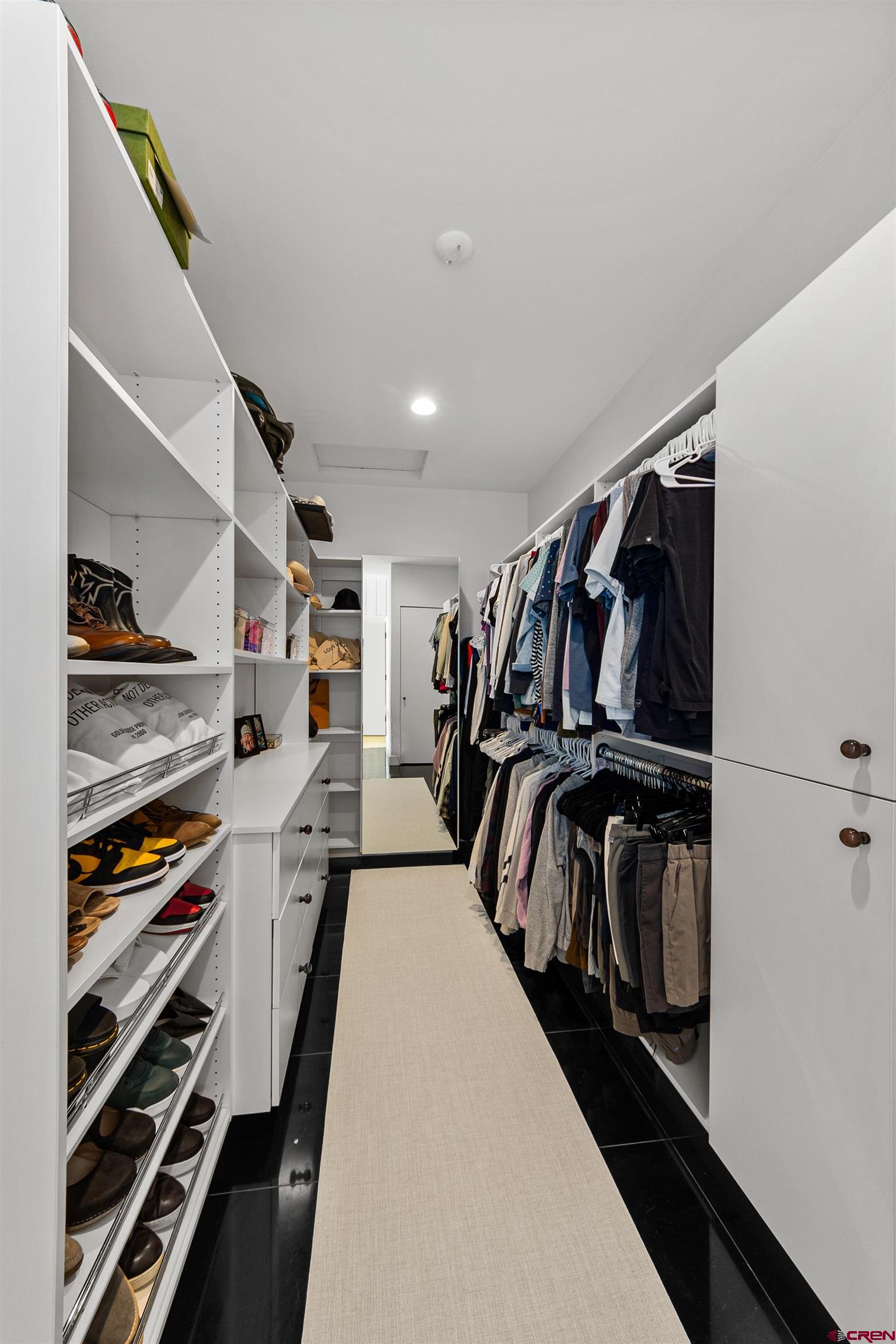 12 Falcon Way Durango, CO 81301 - Photo 31 of 38 a view of walk in closet with clothes and shoes