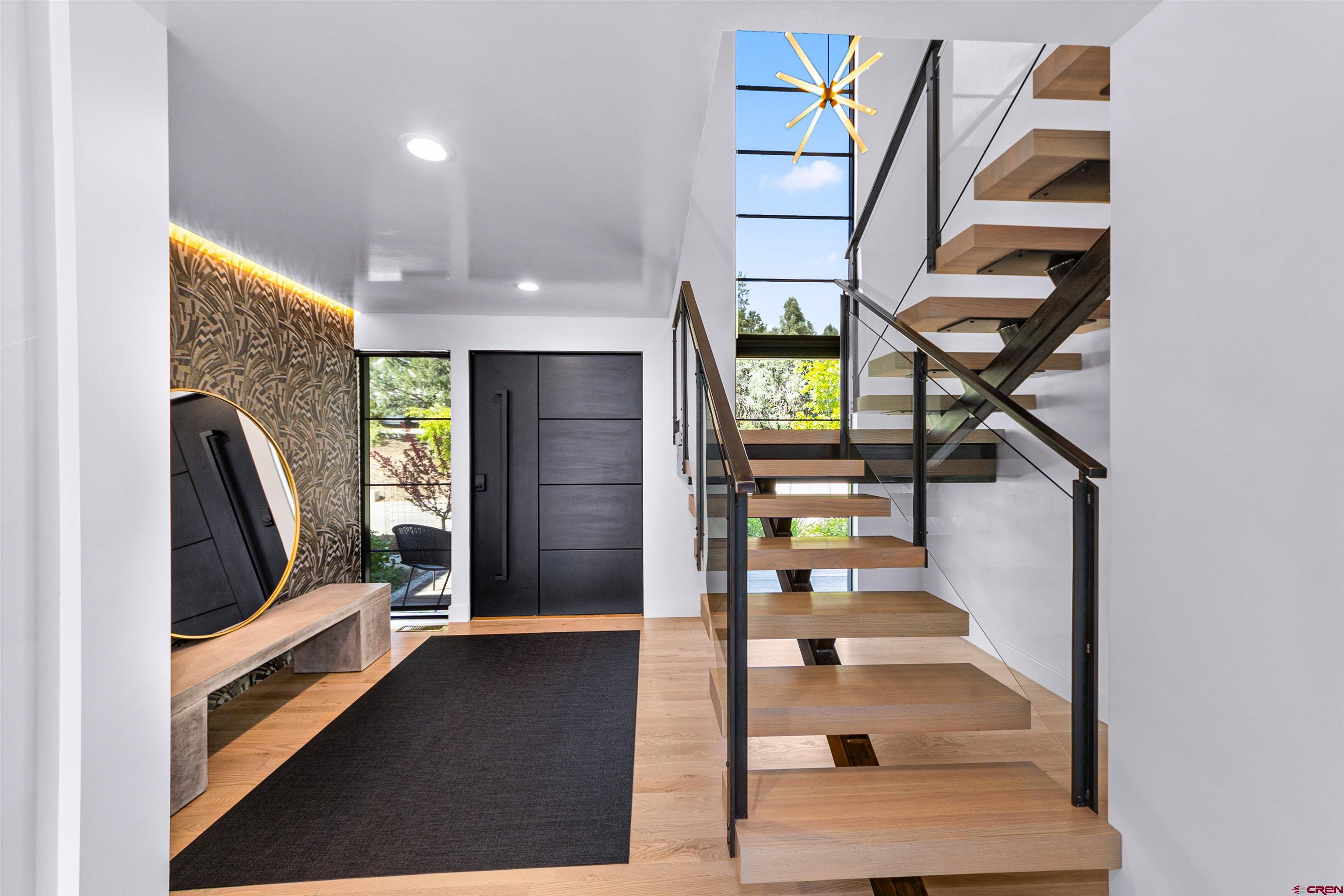 12 Falcon Way Durango, CO 81301 - Photo 9 of 38 a view of entryway and hall with wooden floor