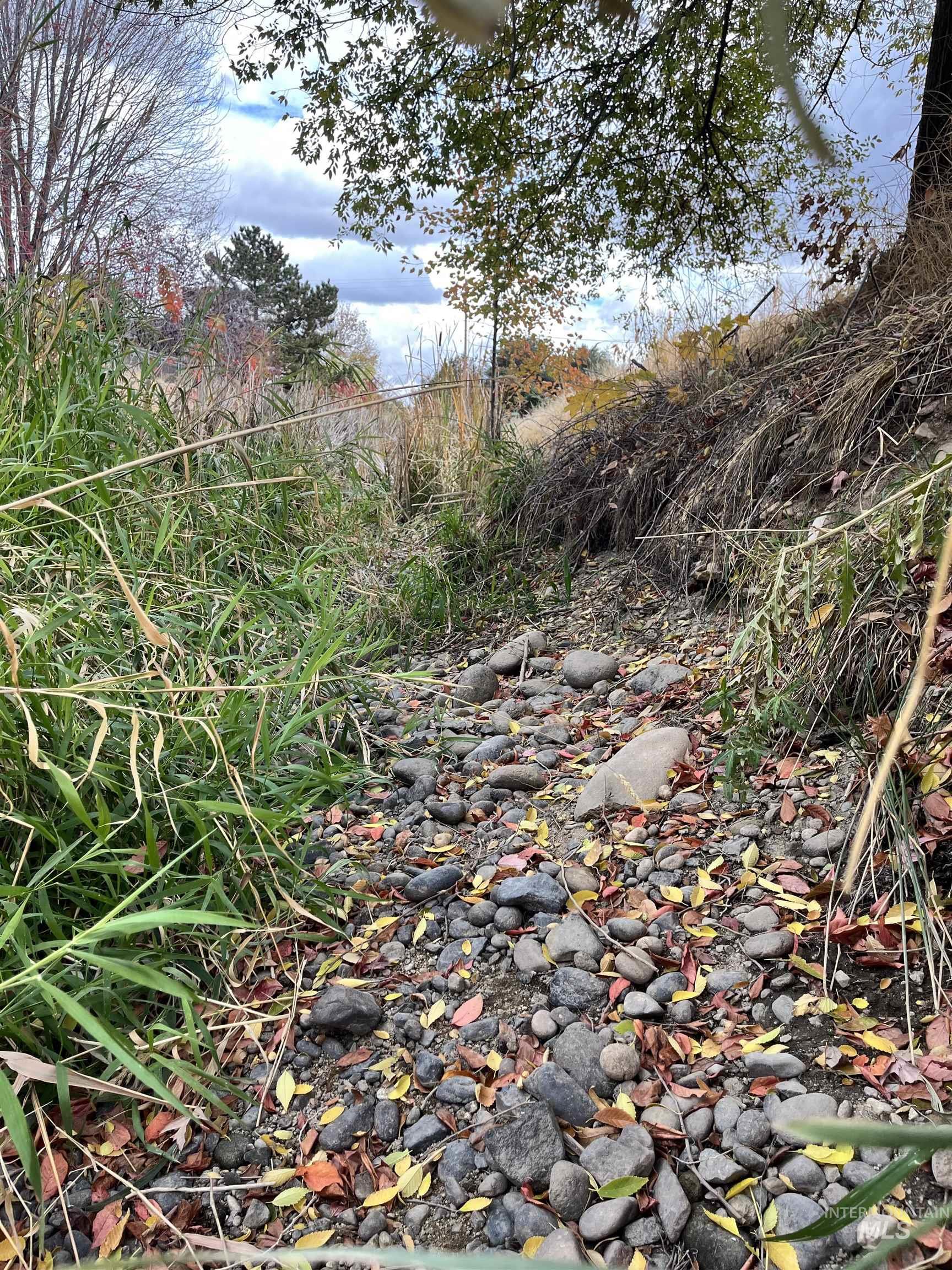 2019 South Locust Grove Road Meridian, ID 83642 - Photo 9 of 20 The northern boundary of the small subdivision is bordered by waterway.