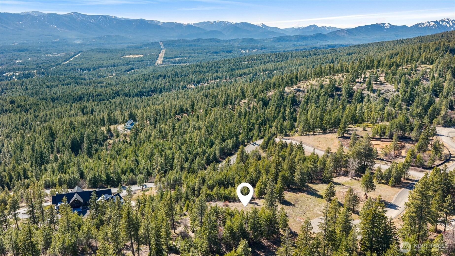 81 Forest Ridge Drive Cle Elum, WA 98922 - Photo 13 of 28 a view of a forest with a street