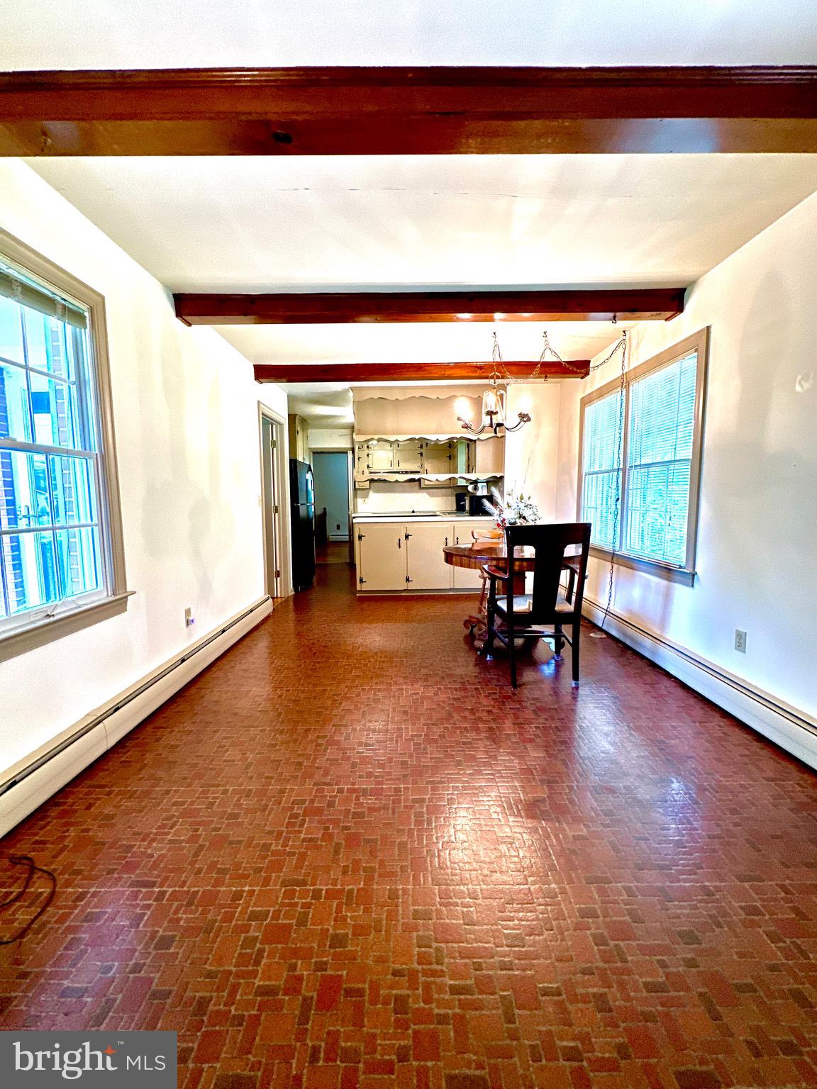 116 Main Street Townsend, DE 19734 - Photo 23 of 68 a dining room with furniture and a floor to ceiling window