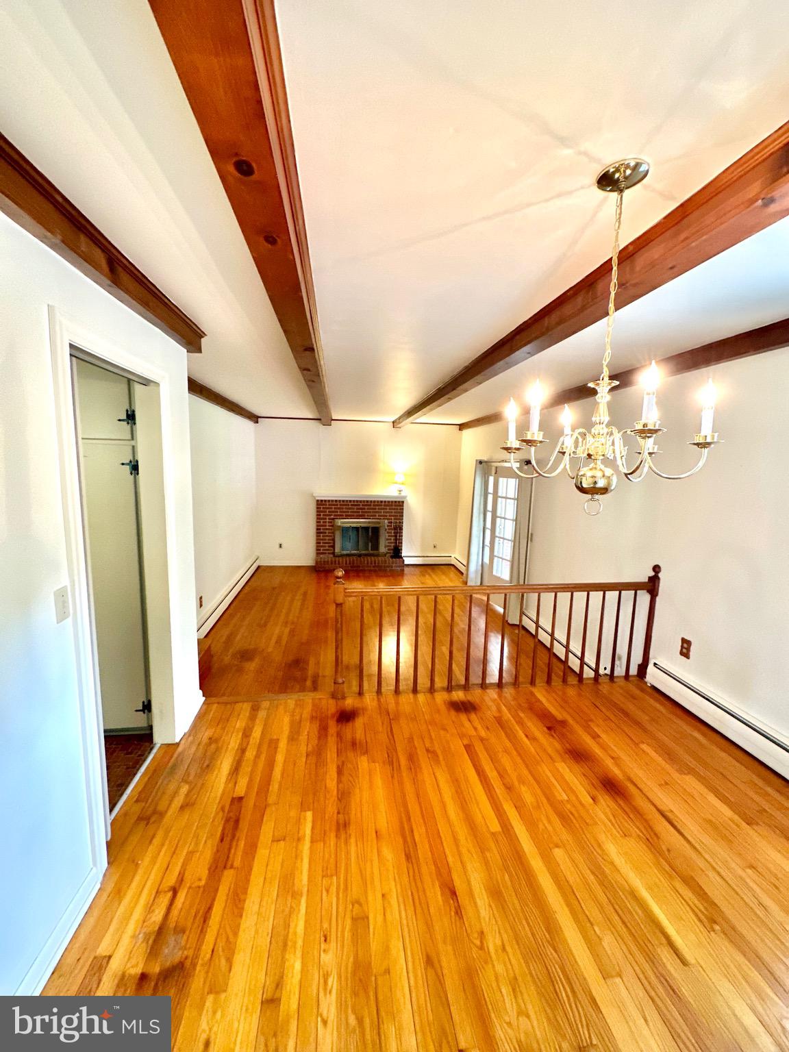 116 Main Street Townsend, DE 19734 - Photo 33 of 68 a bedroom with a bed and wooden floor