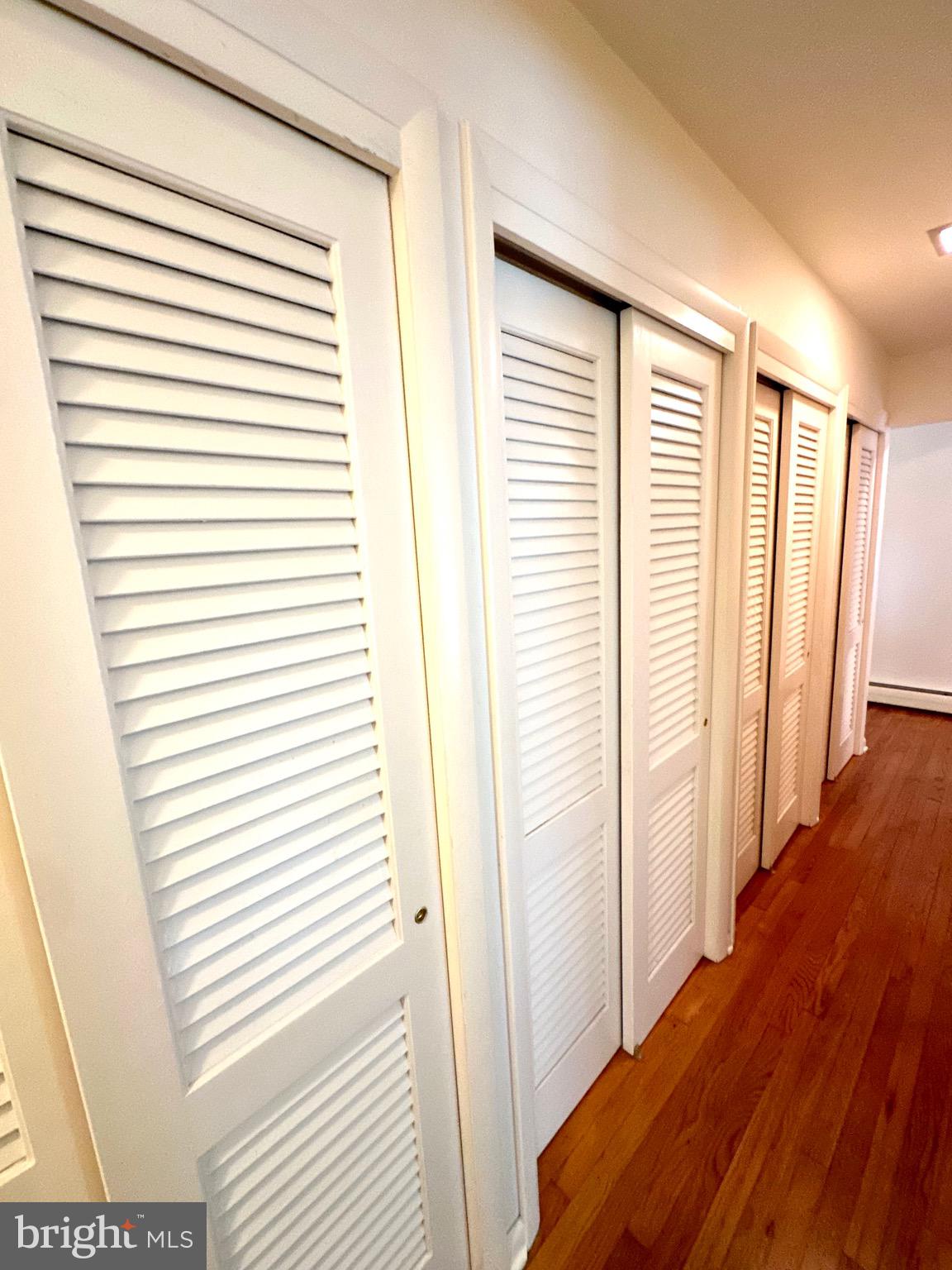 116 Main Street Townsend, DE 19734 - Photo 39 of 68 a view of a bedroom with wooden floor and a window