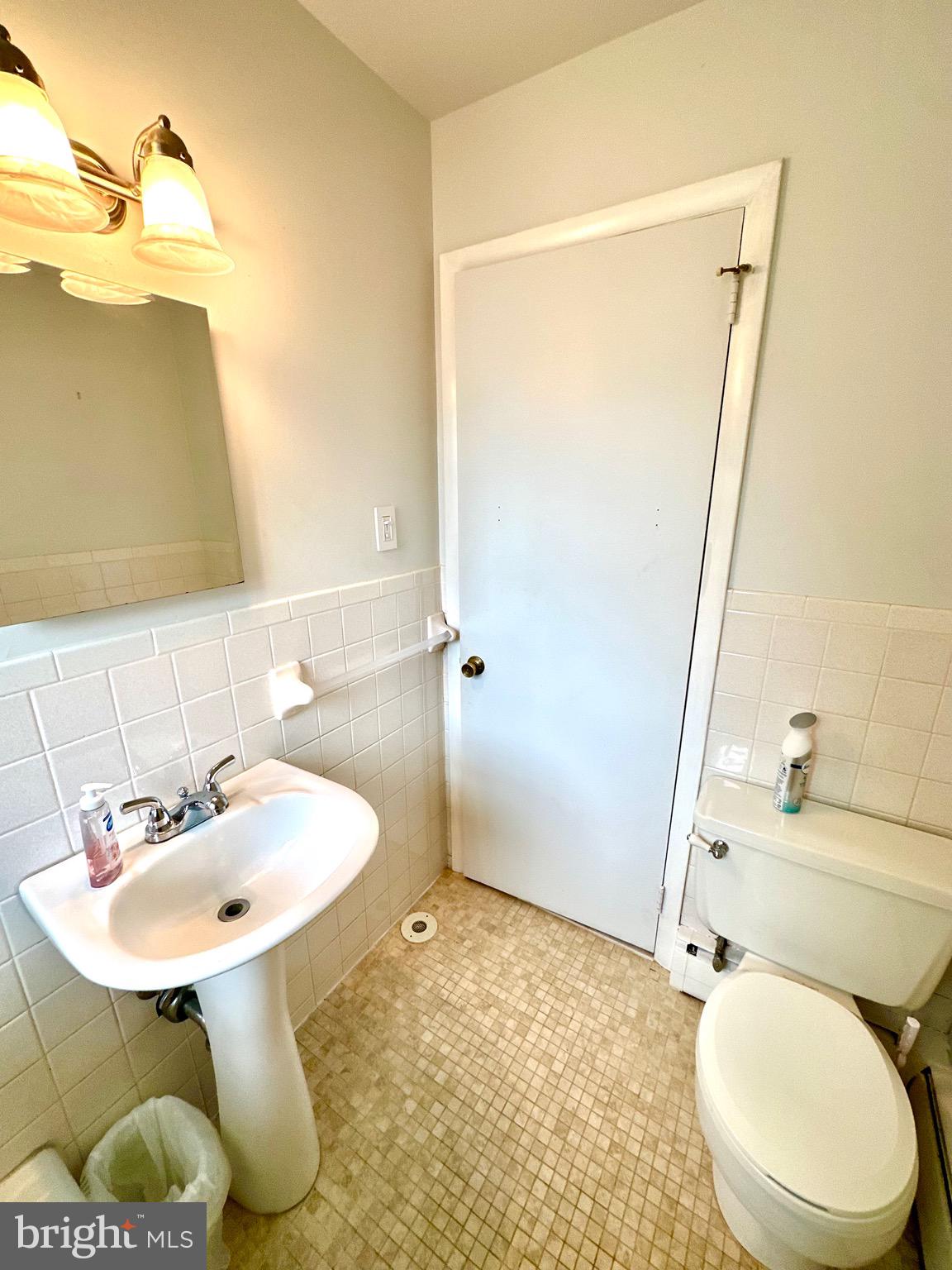 116 Main Street Townsend, DE 19734 - Photo 46 of 68 a bathroom with a sink toilet and a mirror