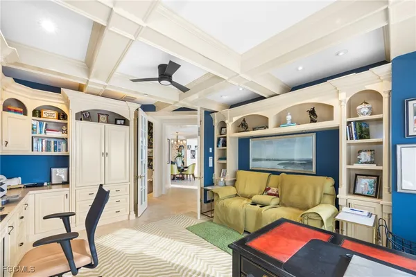 a spacious bedroom with a bed and a large window with outer view