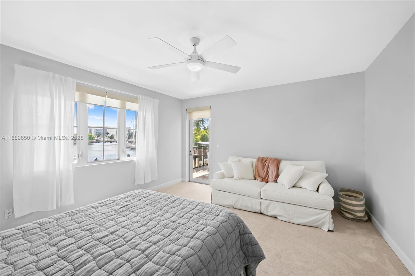 1414 Southeast 12th Street, Unit 1B Fort Lauderdale, FL 33316 - Photo 20 of 34 a bedroom with a large bed and a window