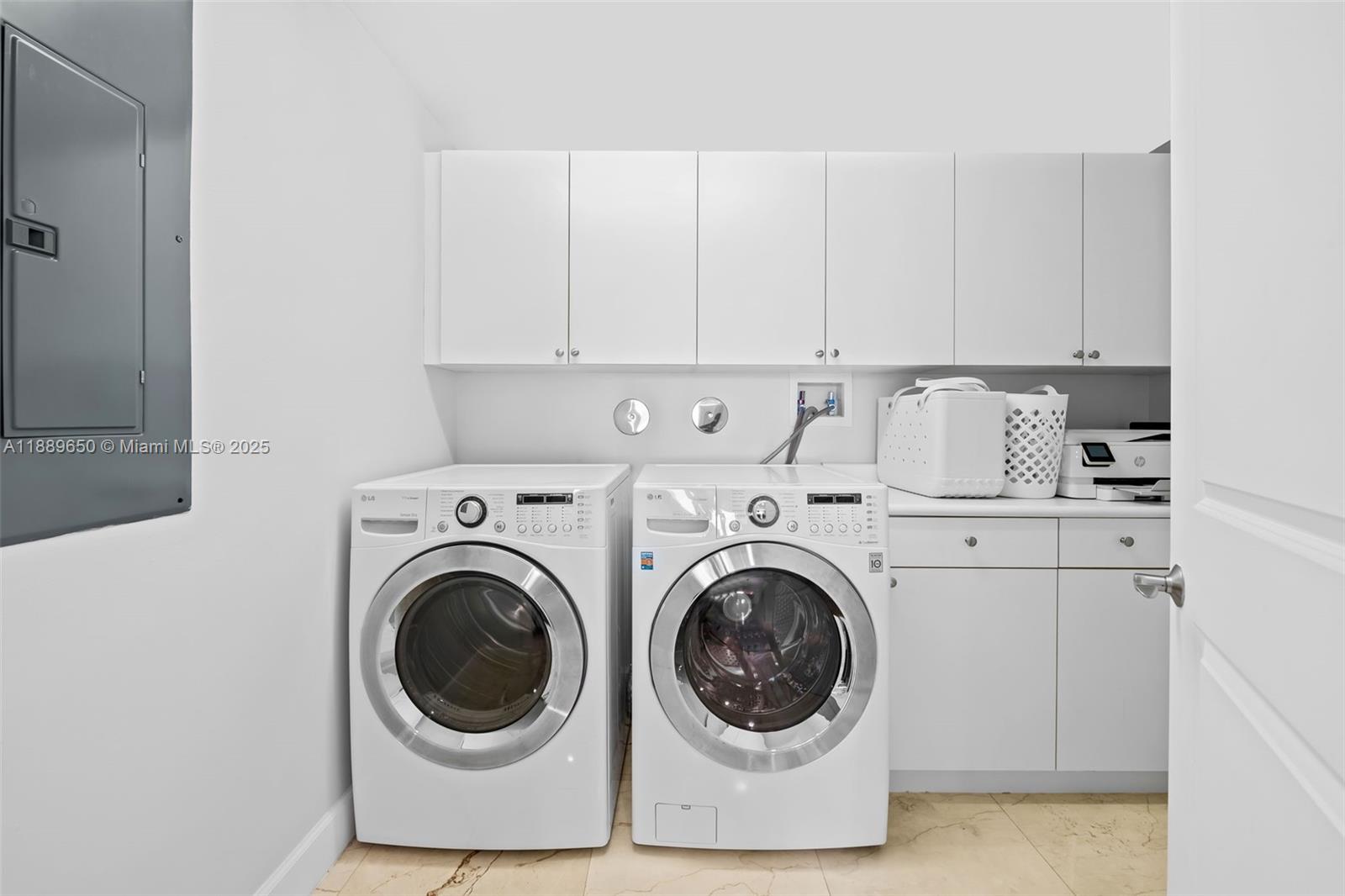 1414 Southeast 12th Street, Unit 1B Fort Lauderdale, FL 33316 - Photo 24 of 34 a utility room with dryer and washer