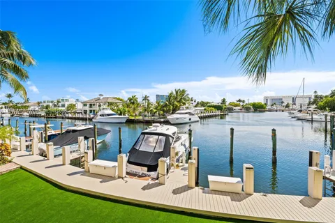a view of a lake with furniture