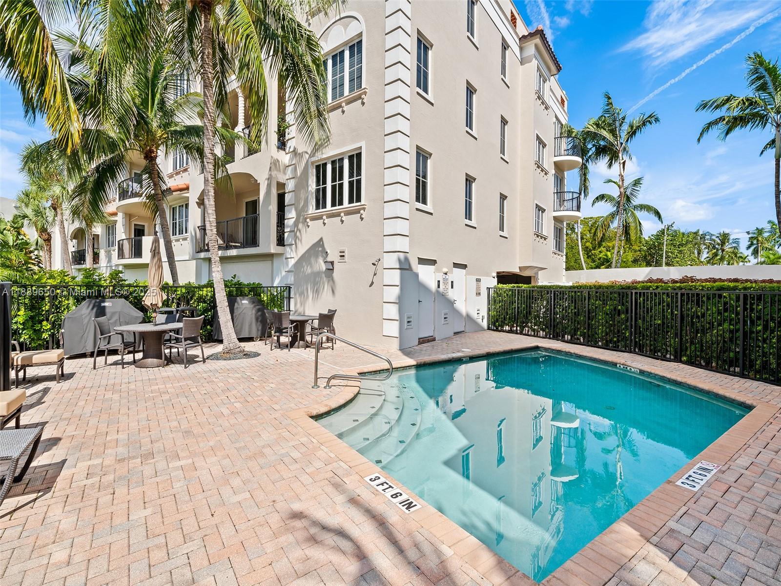 1414 Southeast 12th Street, Unit 1B Fort Lauderdale, FL 33316 - Photo 28 of 34 a view of a swimming pool with a patio