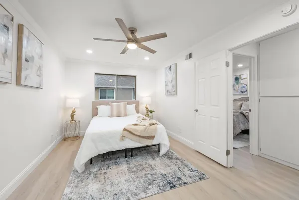 a room with a bed and a window