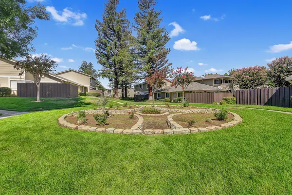 a view of a fountain with a big yard