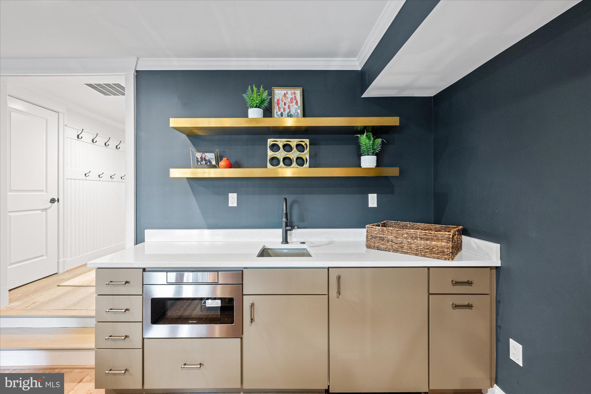 3723 Reservoir Road Northwest Washington, DC 20007 - Photo 17 of 45 a bathroom with a sink and a mirror