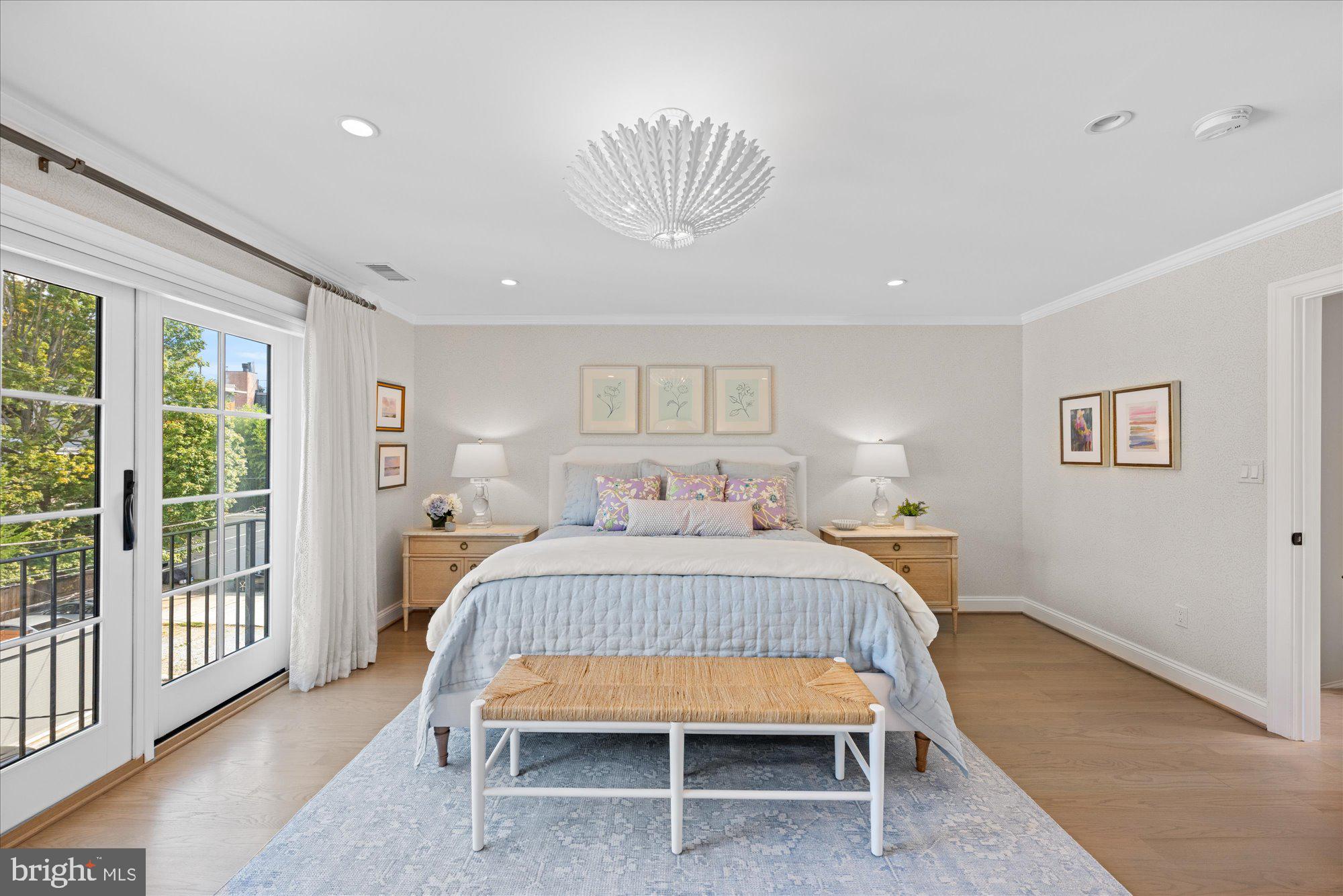 3723 Reservoir Road Northwest Washington, DC 20007 - Photo 18 of 45 a bedroom with a bed and a chair