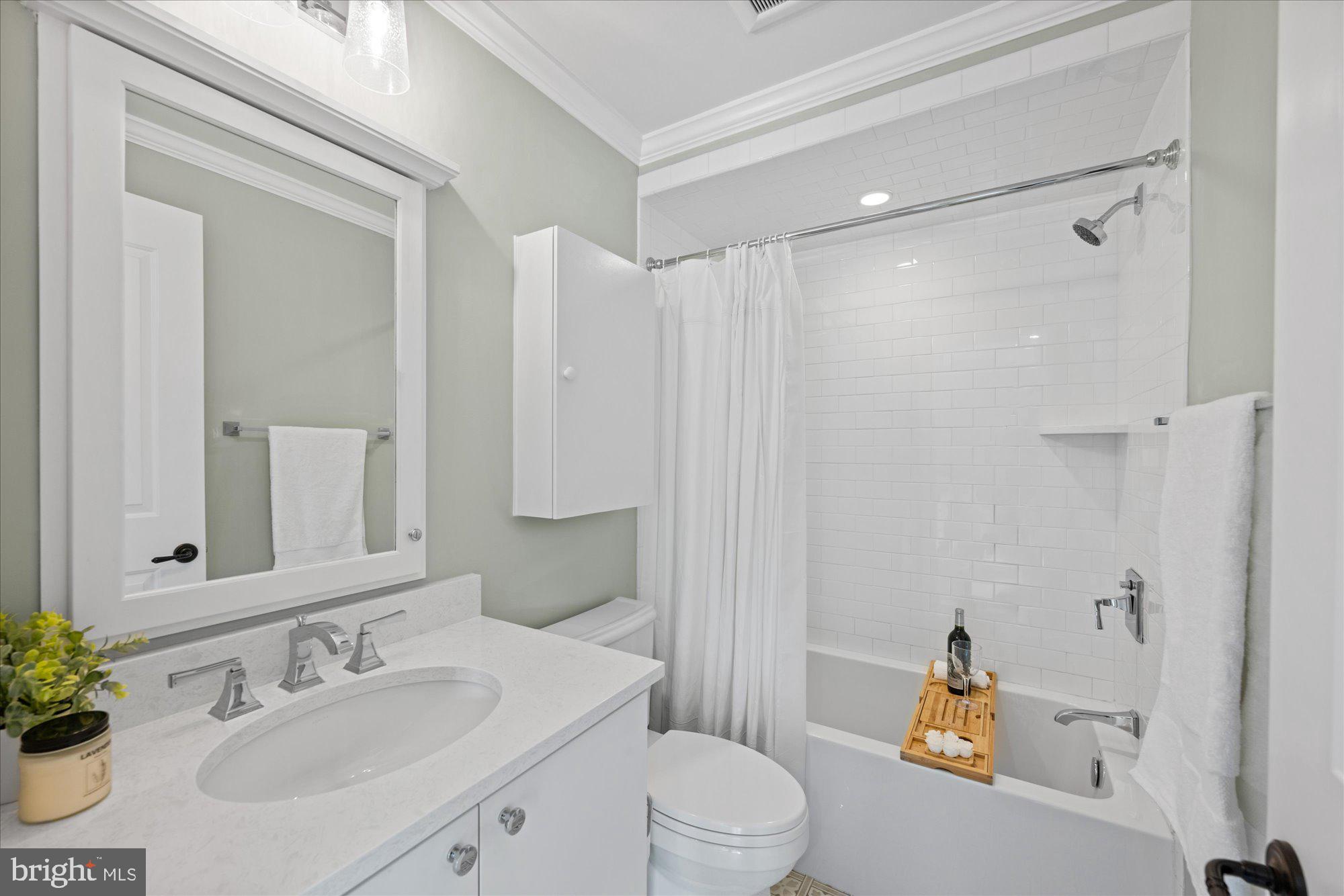 3723 Reservoir Road Northwest Washington, DC 20007 - Photo 24 of 45 a bathroom with a sink toilet and shower