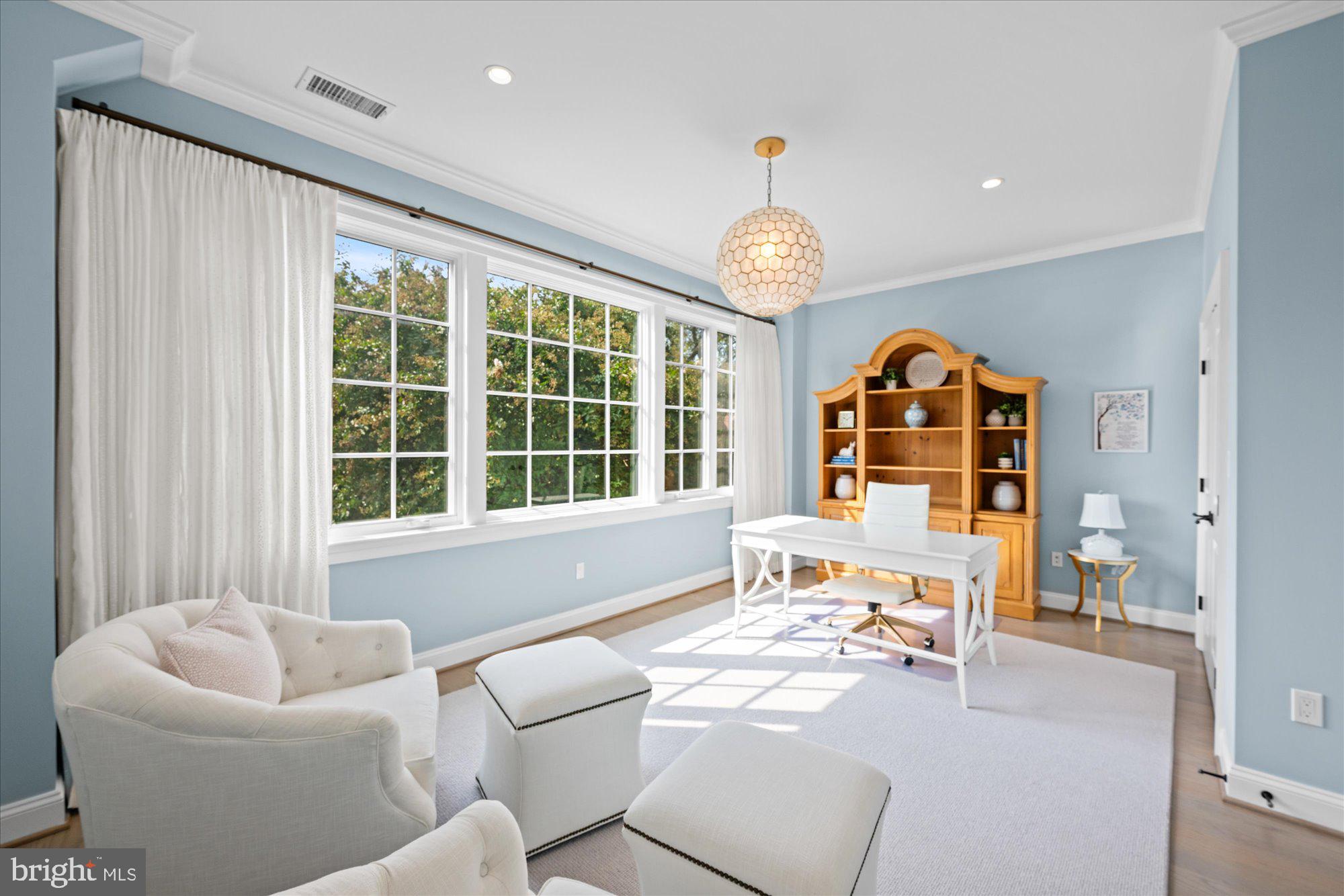 3723 Reservoir Road Northwest Washington, DC 20007 - Photo 26 of 45 a living room with furniture and a large window