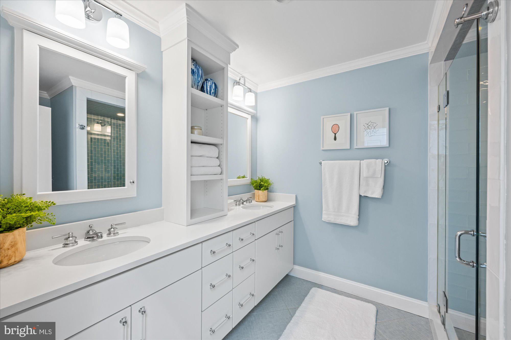 3723 Reservoir Road Northwest Washington, DC 20007 - Photo 29 of 45 a bathroom with a double vanity sink and a mirror