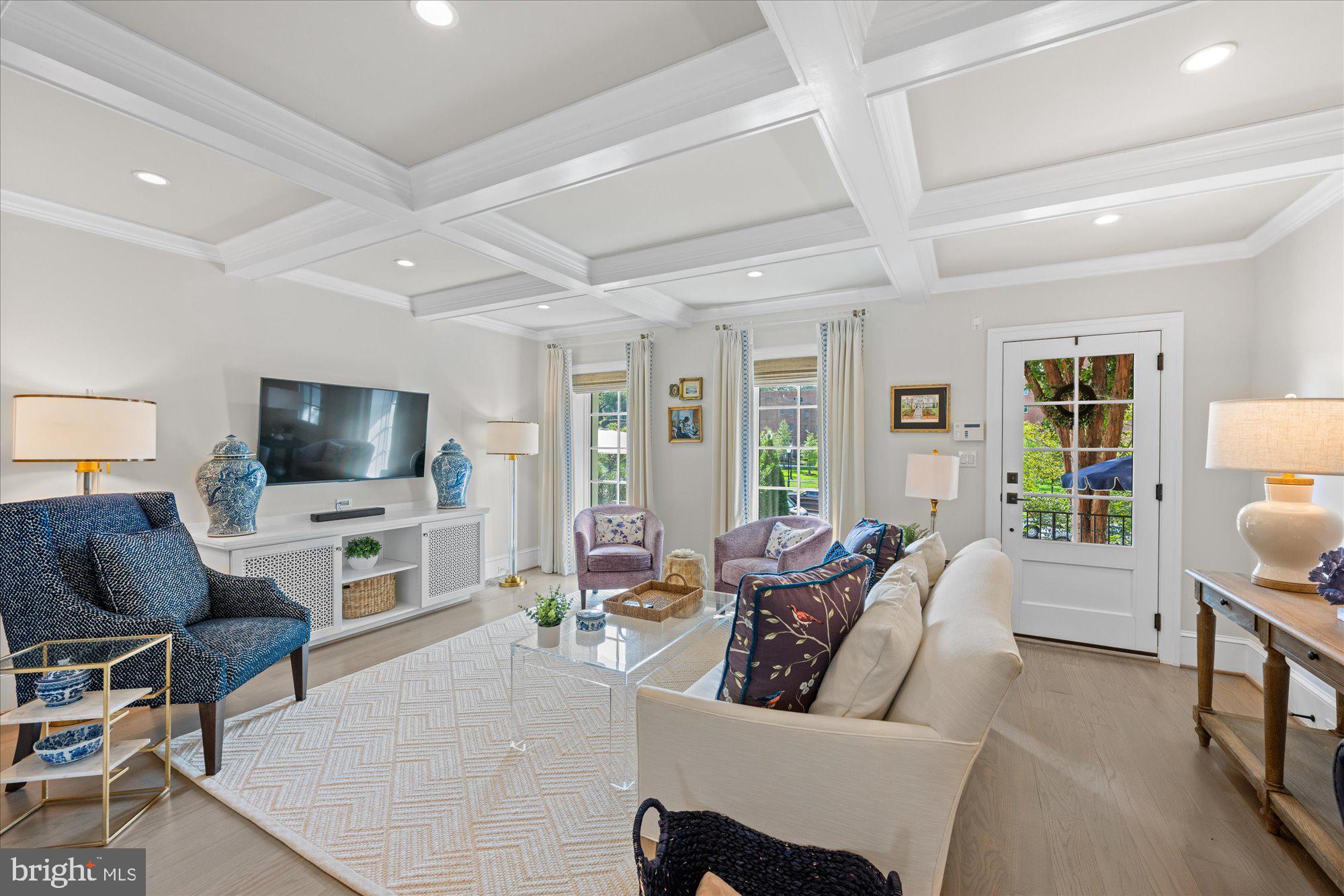 3723 Reservoir Road Northwest Washington, DC 20007 - Photo 4 of 45 a living room with furniture a flat screen tv and a large window