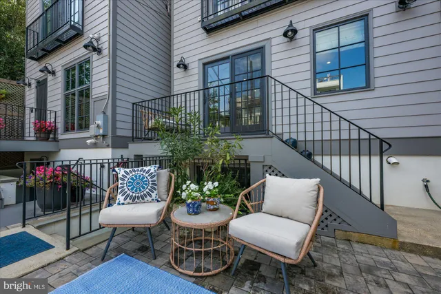 a picture of a bench in front of a window