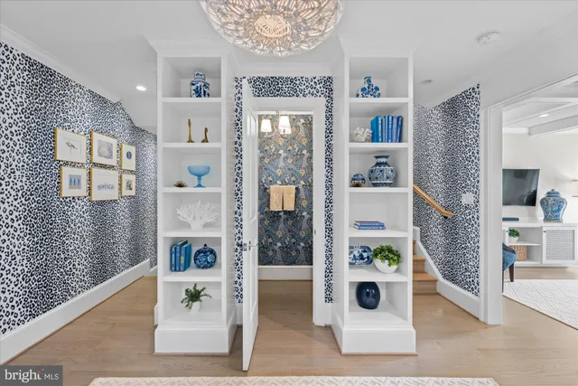 a kitchen with a stove and a white cabinets