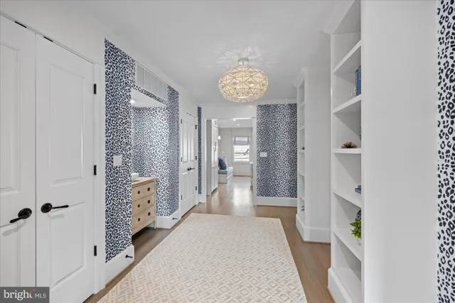 a view of a hallway with windows