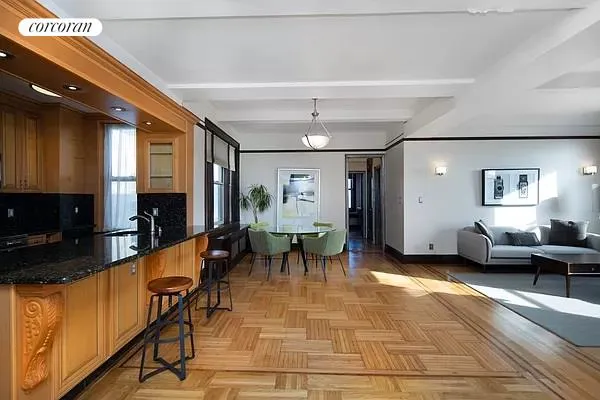 a lobby with furniture and wooden floor