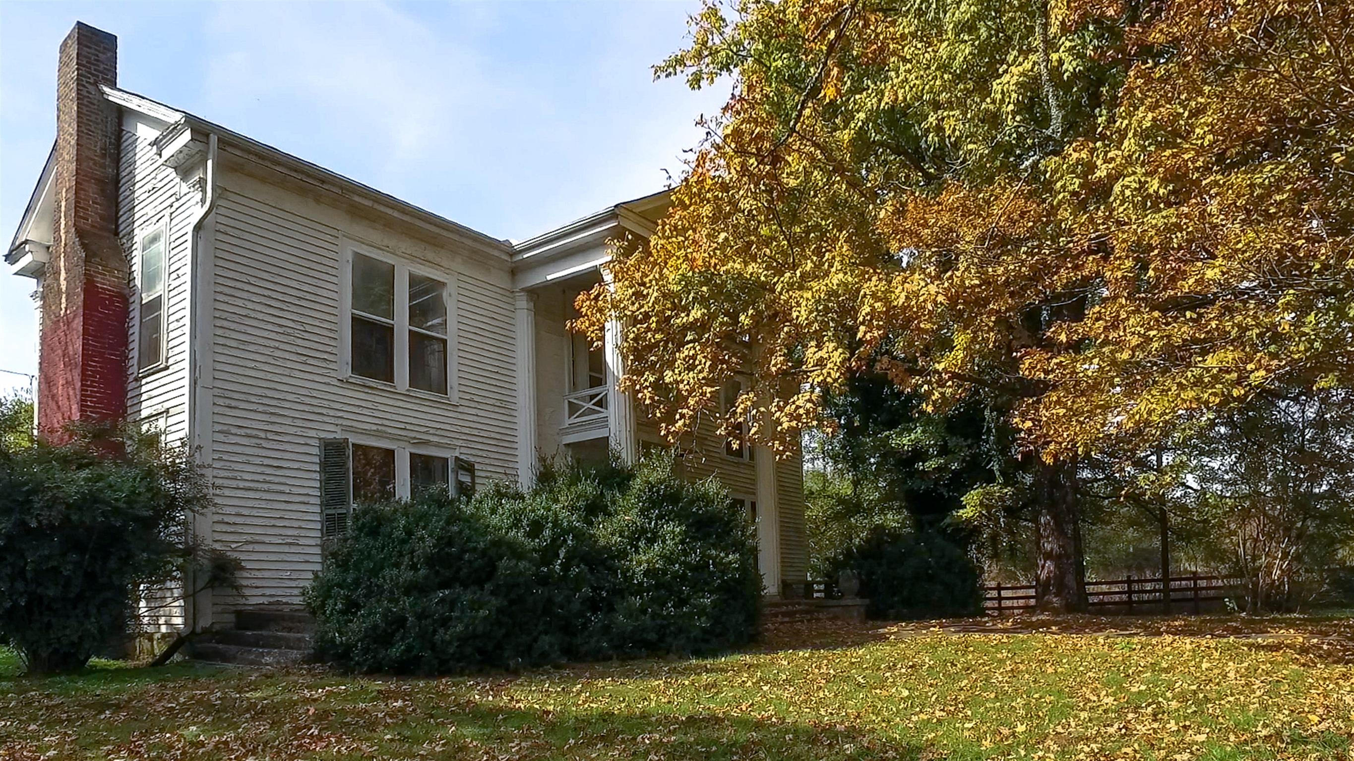 247 Buckeye Loop Lynchburg, TN 37352 - Photo 6 of 21 a backyard of a house with lots of green space