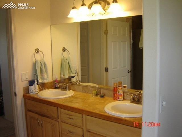 435 Due S Road Florissant, CO 80816 - Photo 9 of 16 Double sinks in master bathroom on east side, oposite of tub and shower