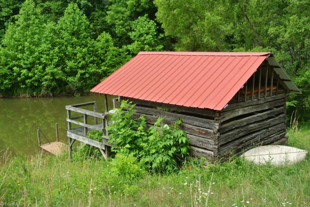 1330 Marshall Ridge Road Pinnacle, NC 27043 - Photo 3 of 24 Fishing Cabin on pond. Bass and Hybrid Blue Gill stocked in pond.