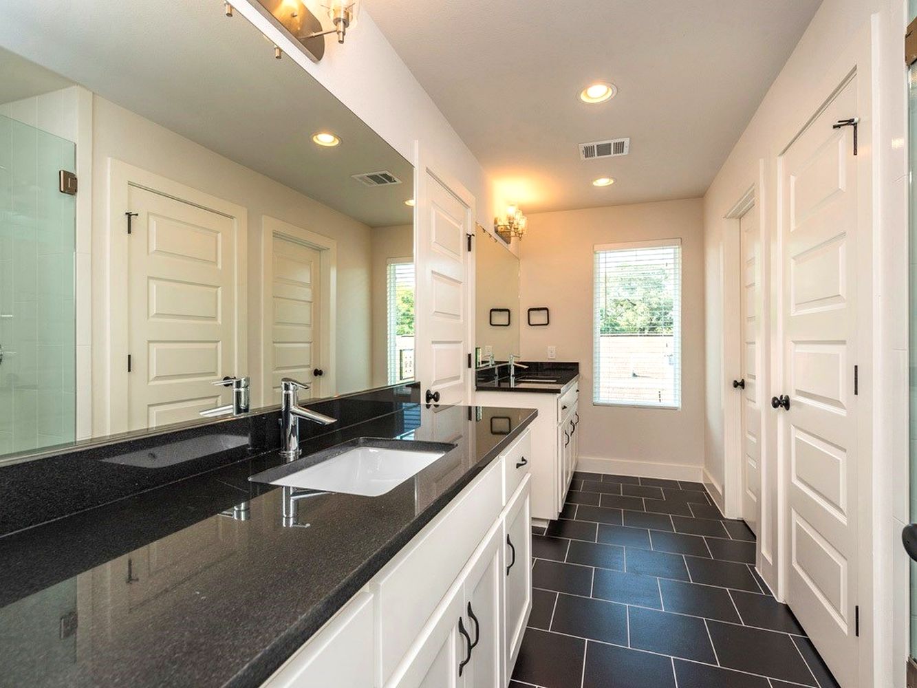 1182 Ridgeway Drive, Unit A Austin, TX 78702 - Photo 15 of 27 a large kitchen with a sink and large window