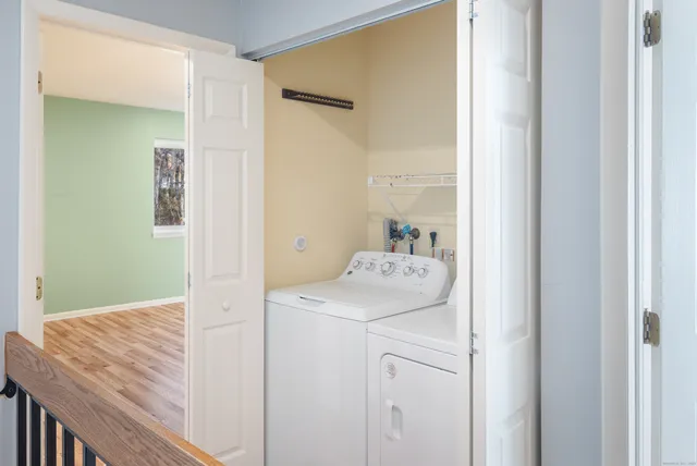 a bathroom with a sink and vanity