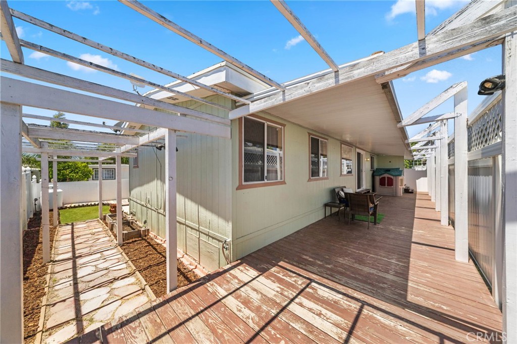 26311 Jackson Avenue, Unit 35 Murrieta, CA 92563 - Photo 25 of 41 a view of a porch with wooden floor