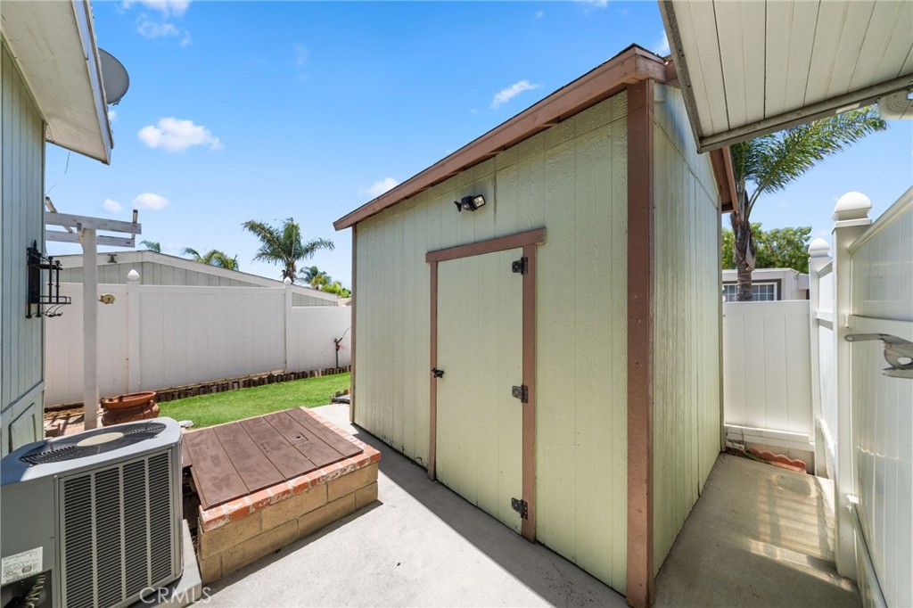 26311 Jackson Avenue, Unit 35 Murrieta, CA 92563 - Photo 28 of 41 a view of a backyard with furniture
