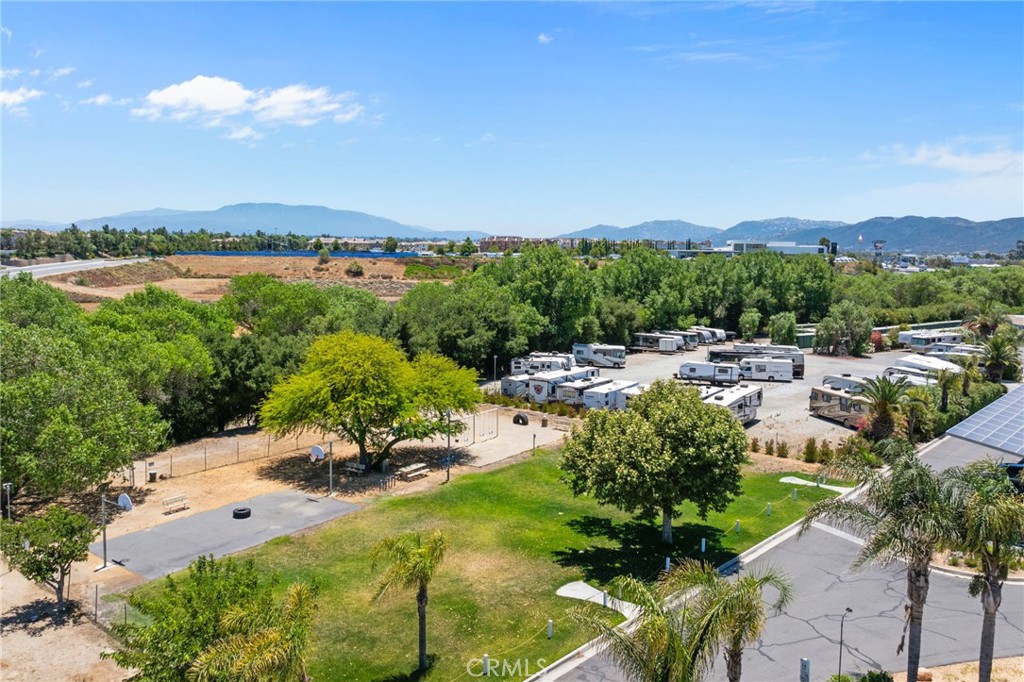26311 Jackson Avenue, Unit 35 Murrieta, CA 92563 - Photo 40 of 41 a view of a lake with outdoor space