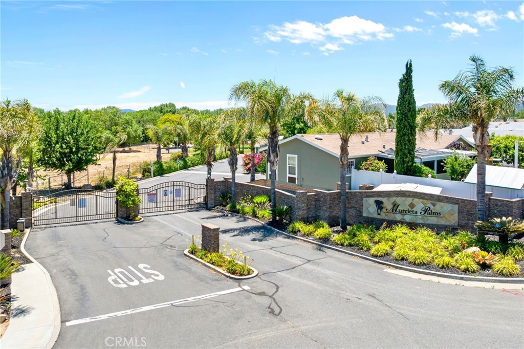 26311 Jackson Avenue, Unit 35 Murrieta, CA 92563 - Photo 41 of 41 a view of a swimming pool with a patio