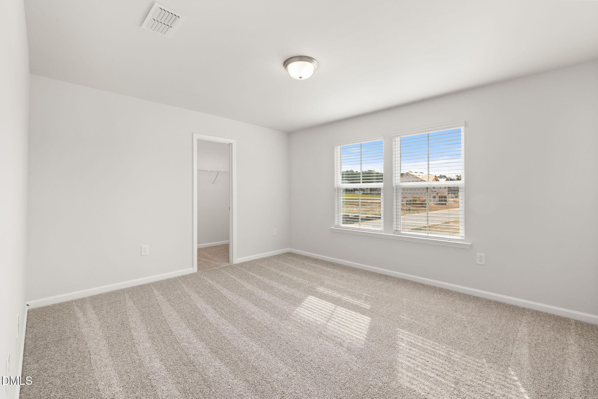 617 Ben Ledi Court Raleigh, NC 27603 - Photo 18 of 33 a view of an empty room with a window