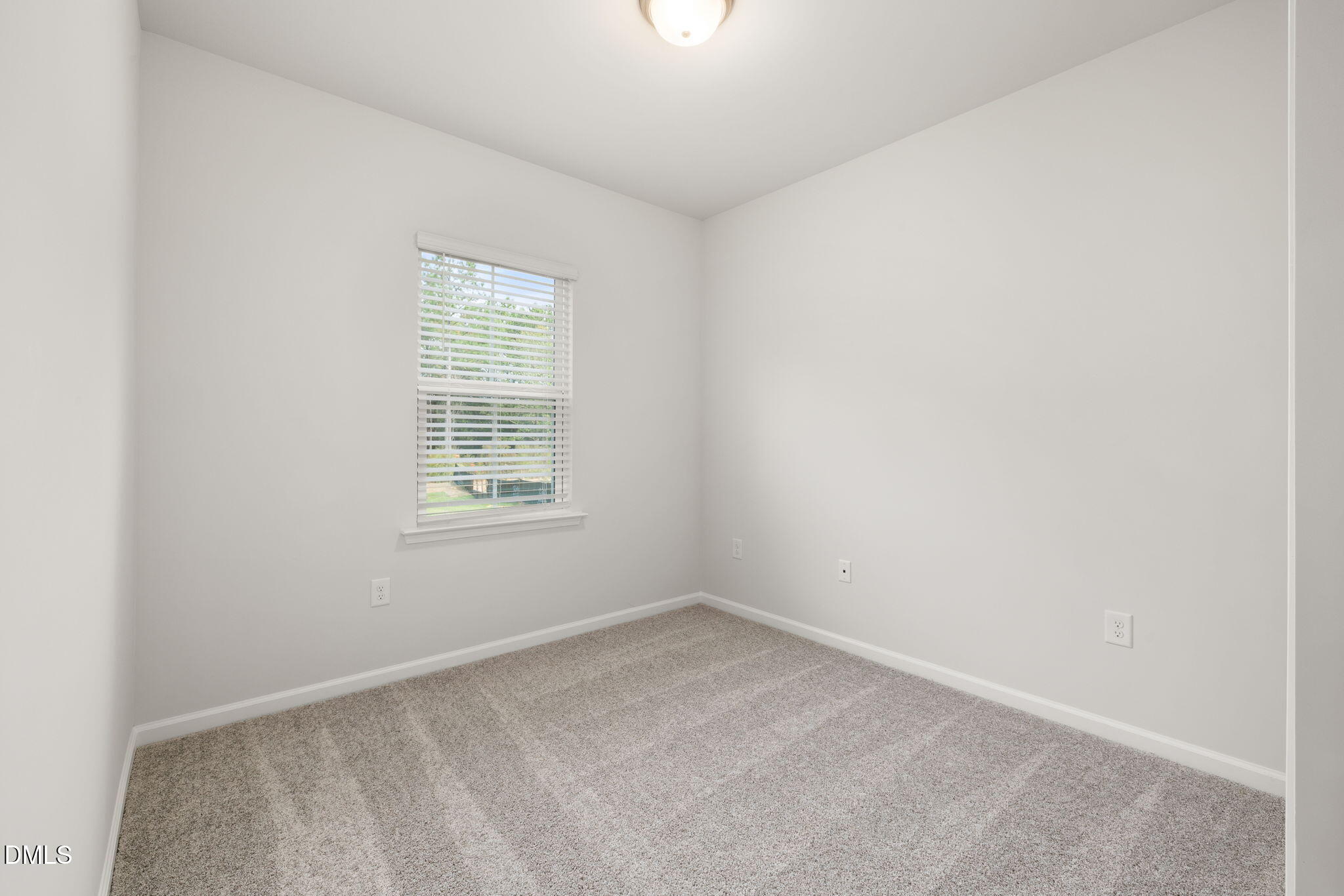 617 Ben Ledi Court Raleigh, NC 27603 - Photo 20 of 33 an empty room with a window