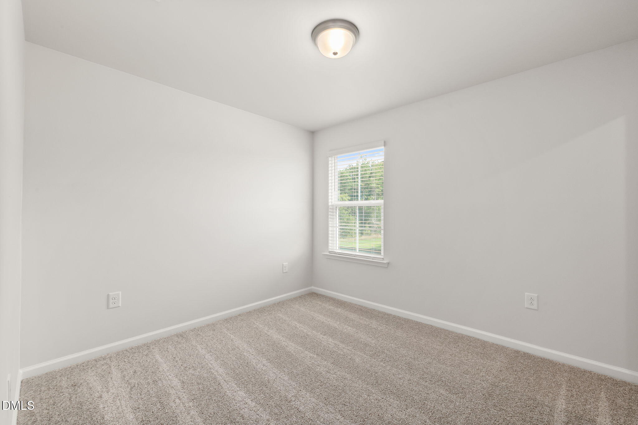617 Ben Ledi Court Raleigh, NC 27603 - Photo 21 of 33 an empty room with a window