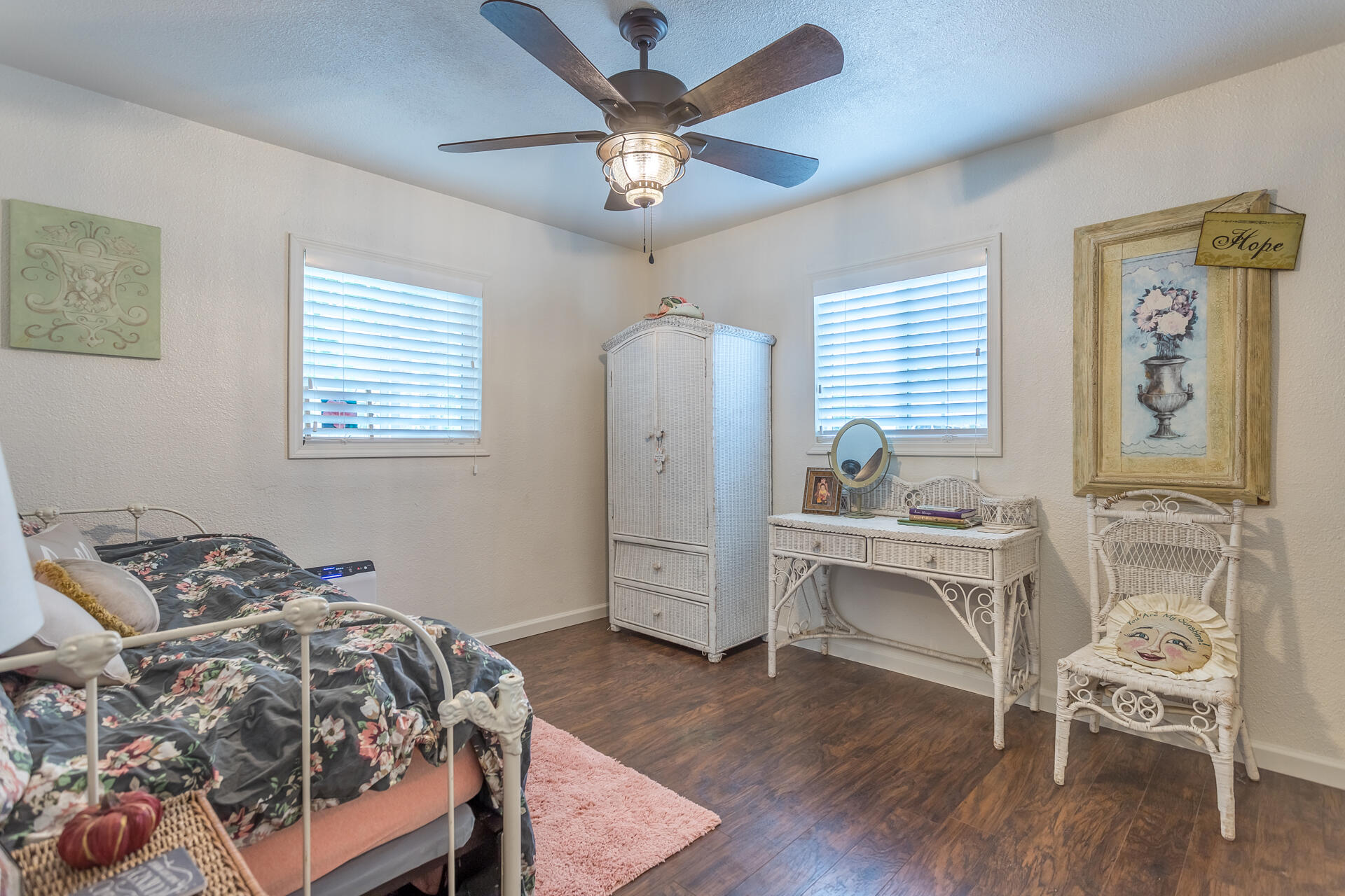 1115 Layton Road Redding, CA 96002 - Photo 15 of 26 a bedroom with a bed and a table in it