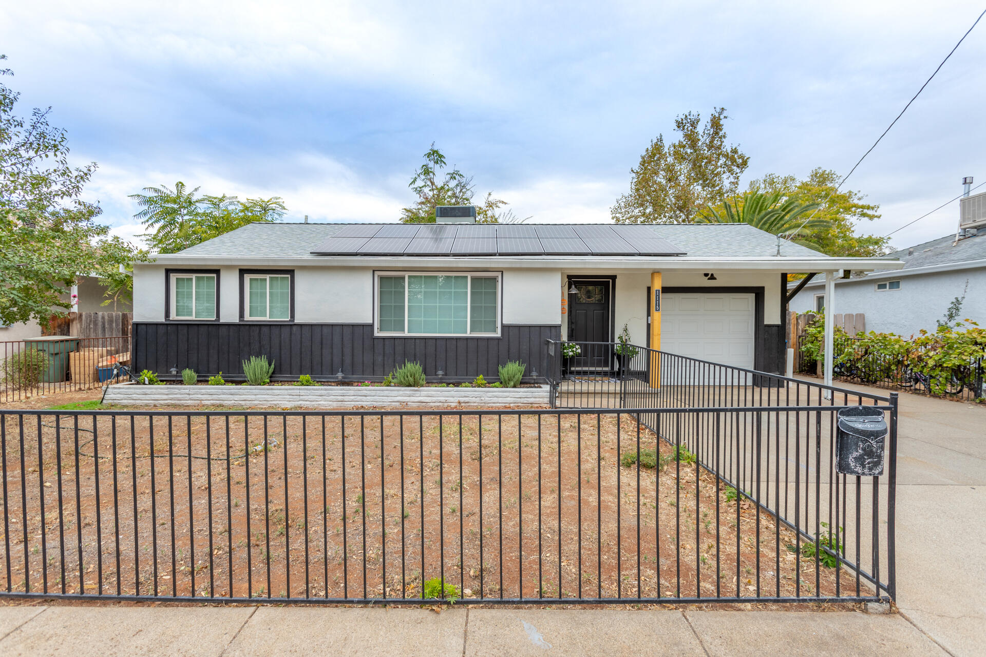 1115 Layton Road Redding, CA 96002 - Photo 3 of 26 a view of a house with a balcony