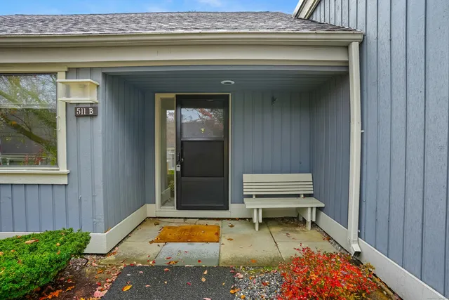 a bench in front of door
