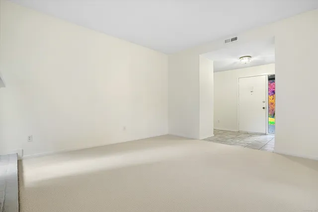 a bathroom with a sink vanity and mirror