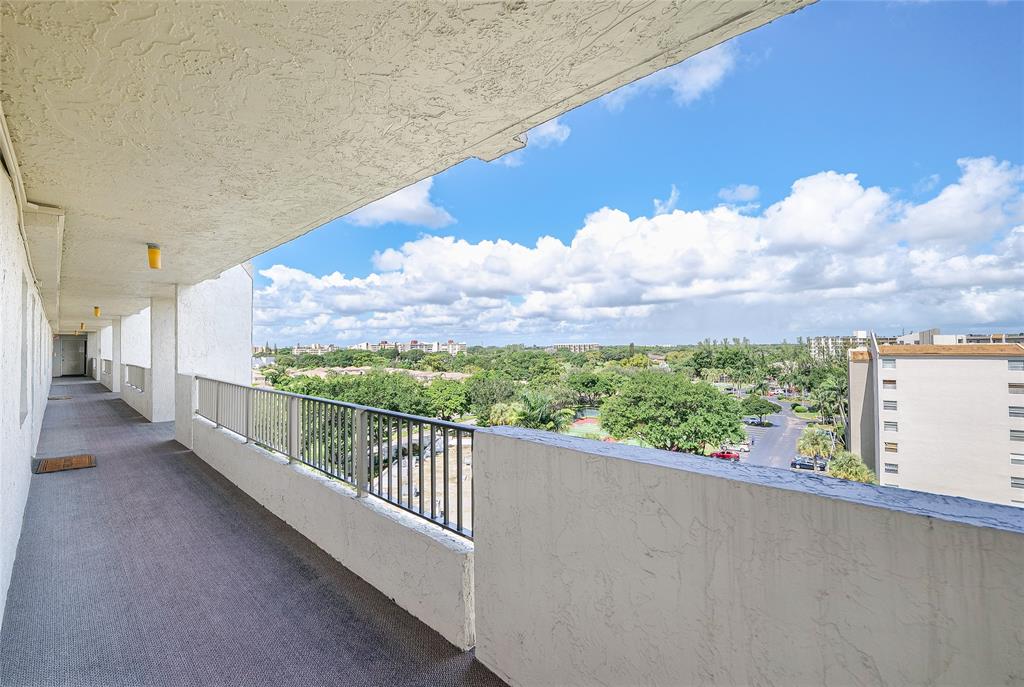 3910 Inverrary Boulevard, Unit 805B Lauderhill, FL 33319 - Photo 20 of 38 a view of a balcony with an outdoor seating