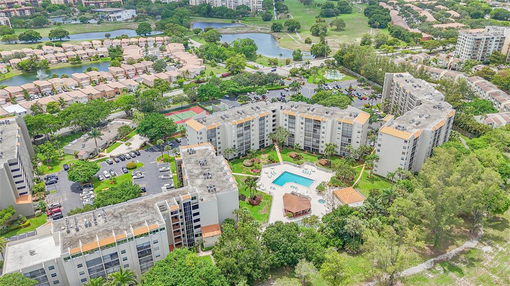 3910 Inverrary Boulevard, Unit 805B Lauderhill, FL 33319 - Photo 24 of 38 an aerial view of a house with a garden