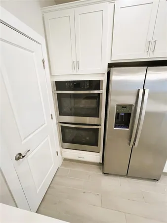 a utility room with washer and dryer