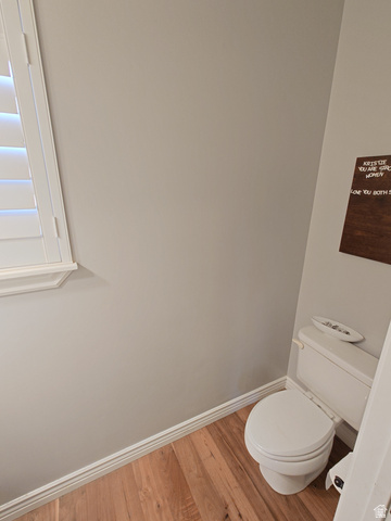 552 Sunset Crest Way Draper, UT 84020 - Photo 29 of 68 Half bath featuring baseboards and wood finished floors