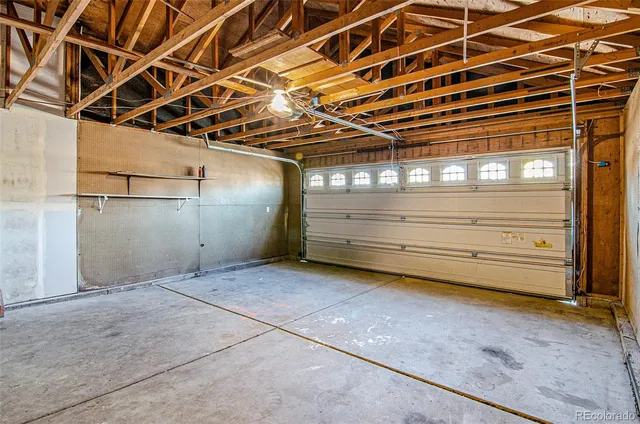 a view of backyard with a deck and wooden floor